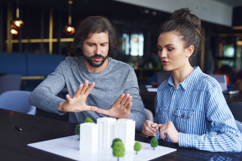 businessman explaining concept details x