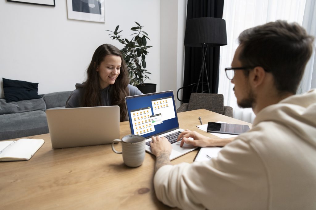 couple desk working together from home x
