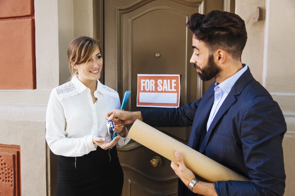 real estate agent business woman front door x